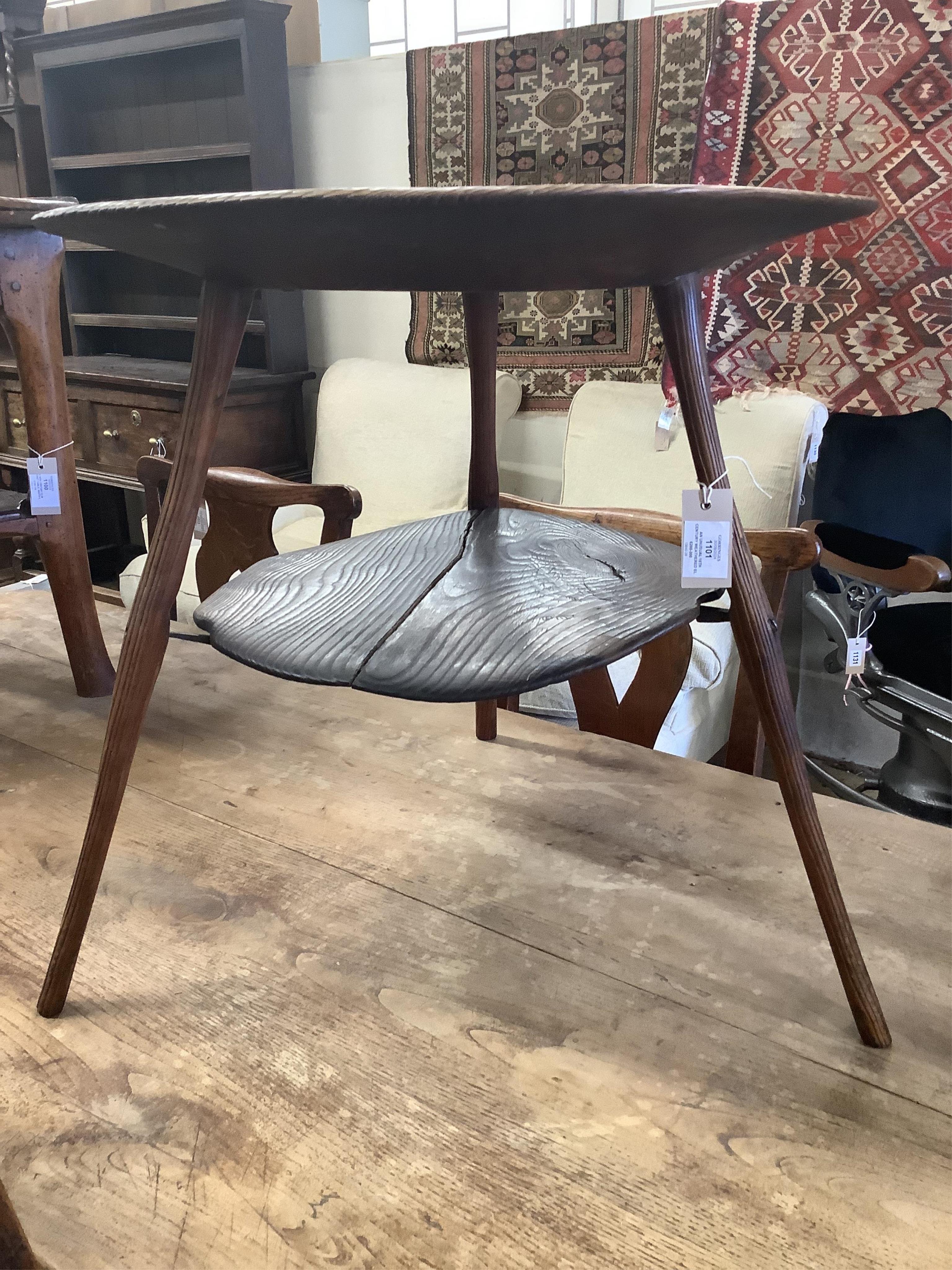 An unusual 18th century weathered elm cricket table, width 61cm, height 60cm. Condition - fair to good